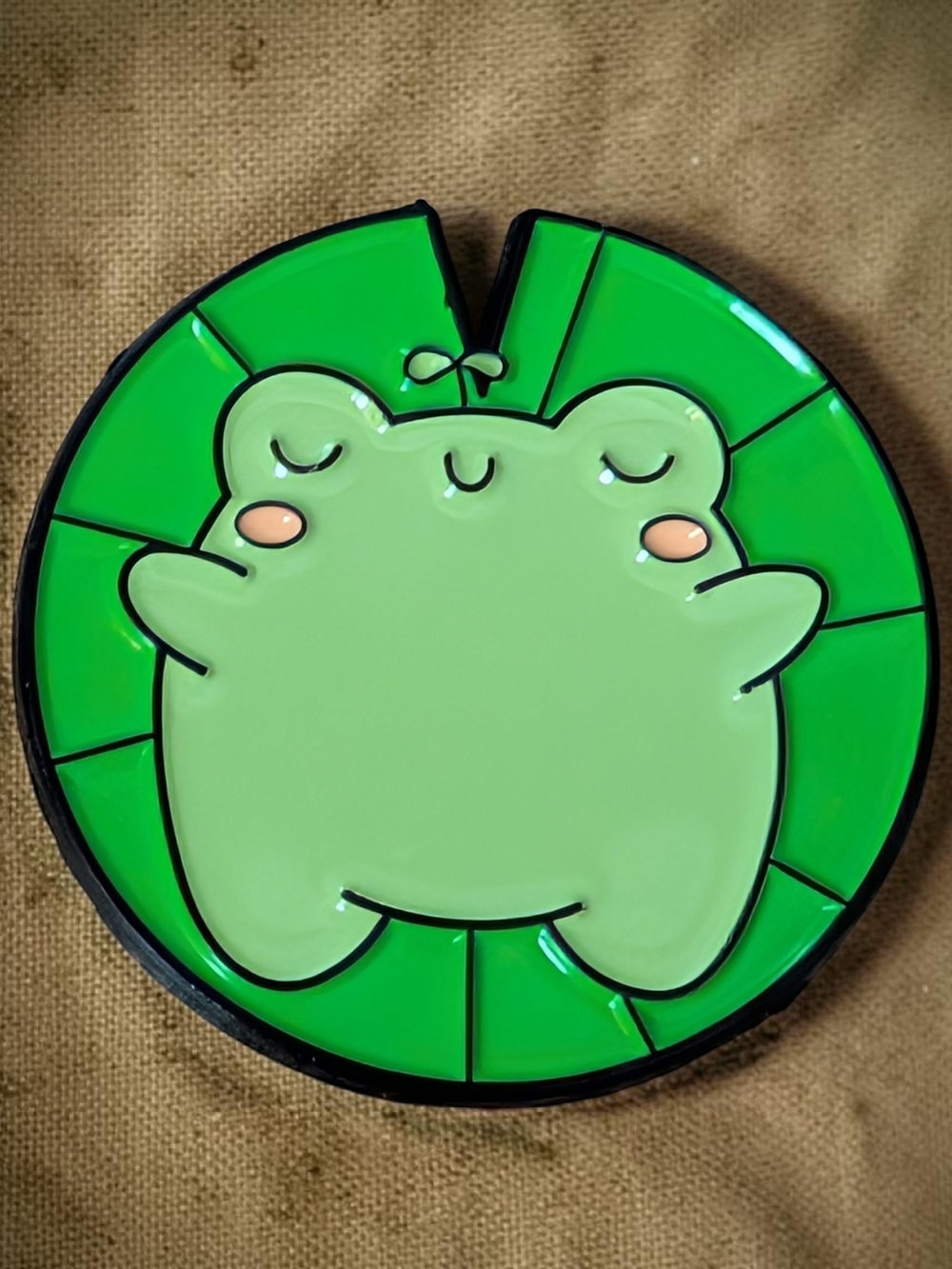 Cute Green Frog Chilling on A Lily Pad